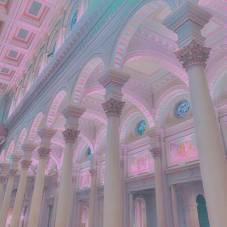 an edited photograph of the interior of an ornate building full of archways and pillars. the image is colored in pastel pinks and blues.